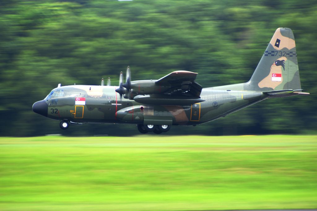 Lockheed C-130 Hercules (N732) - C-130H before touch down on runway 20