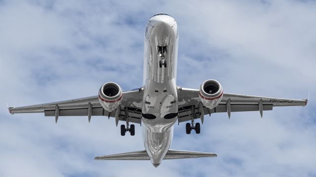 — — - Virgin, E190, on short finals.