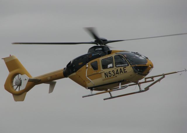 Eurocopter EC-635 (N534AE) - Experimental EC-135 doing some flight test at the Downtown Shreveport airport. Not real sure what the probe is on the front of the aircraft but they kept going up and down the runway sideways and almost backwards chasing a van driving on the runway.