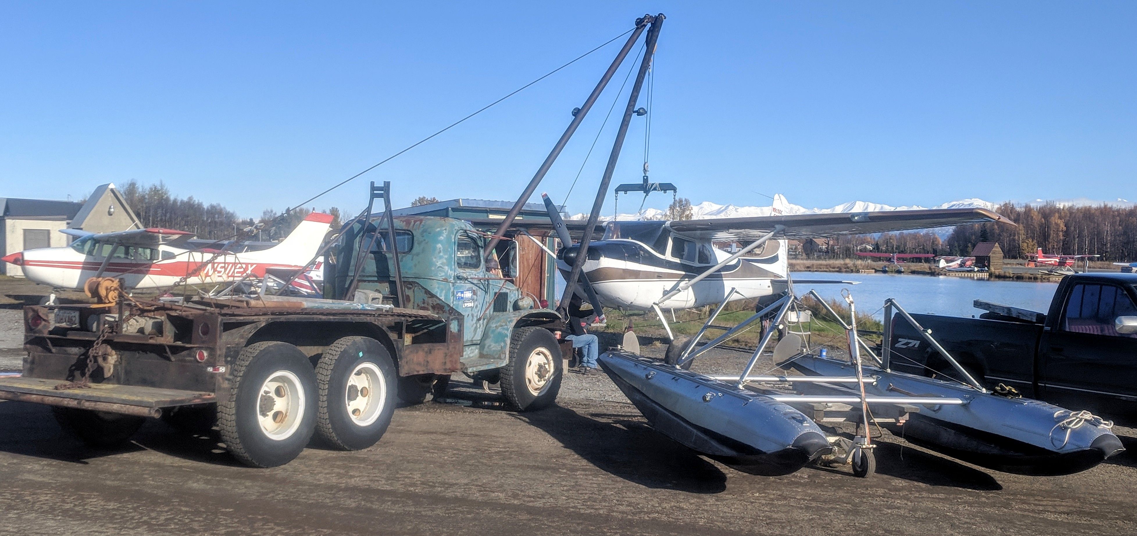 Cessna Skywagon 180 (N9150C) - Time to change from floats to wheels, float slip area, Lake Hood, Anchorage, AK