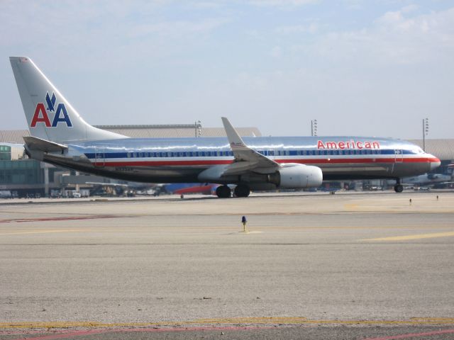 Boeing 737-800 (N935AN) - Holding on RWY 19R