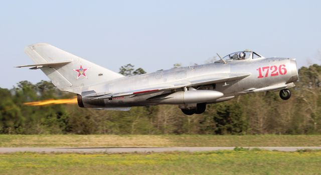 MIKOYAN MiG-17 (N1726M) - A Mikoyan-Gurevich MiG-17F Fresco (license-built in 1960 by Polish manufacturer WSK-PZL Mielic as an Lim-5) departing H. L. Sonny Callahan Airport, Fairhope, AL, during the 2023 Classic Jet Aircraft Association Jet Blast - March 3, 2023. 