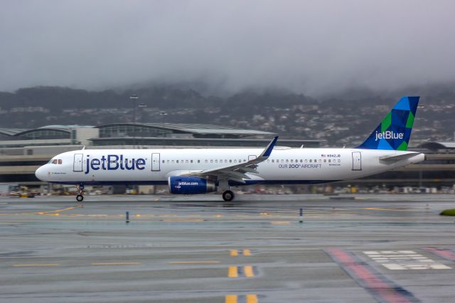 Airbus A321 (N942JB) - JetBlue Menta Fresca taking off 10L from KSFO. This is JetBlues 200th aircraft.br /br /a rel=nofollow href=http://www.thePilotsEye.comwww.thePilotsEye.com/a