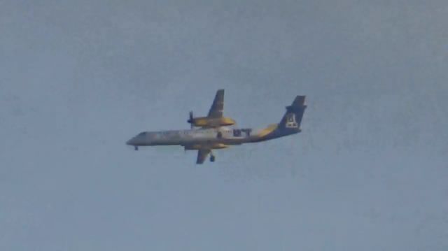 de Havilland Dash 8-400 (N441QX) - Lowering gear as it starts to make its approach into KSNA from Santa Rosa, showing off its "Alaska Nanooks" special livery