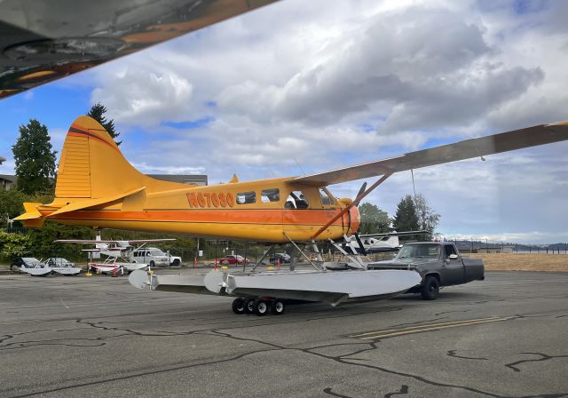 De Havilland Canada DHC-2 Mk1 Beaver (N67680) - Beaver being pushed by a little half-truck. 