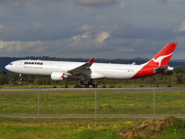 Airbus A330-300 (VH-QPJ) - Putting down on runway 05. Thursday 12th July 2012.