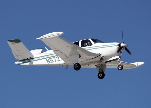 Beechcraft 35 Bonanza (N5727V) - 1966 Beech V35 landing at Downtown Shreveport. New paint since I shot it 7 years ago at Shreveport Regional.