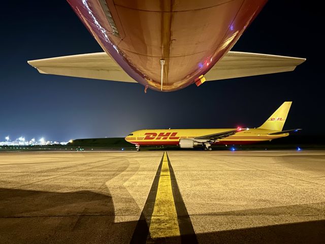 OE-LYA — - Aircraft taxiing to runway at CDG Airport.