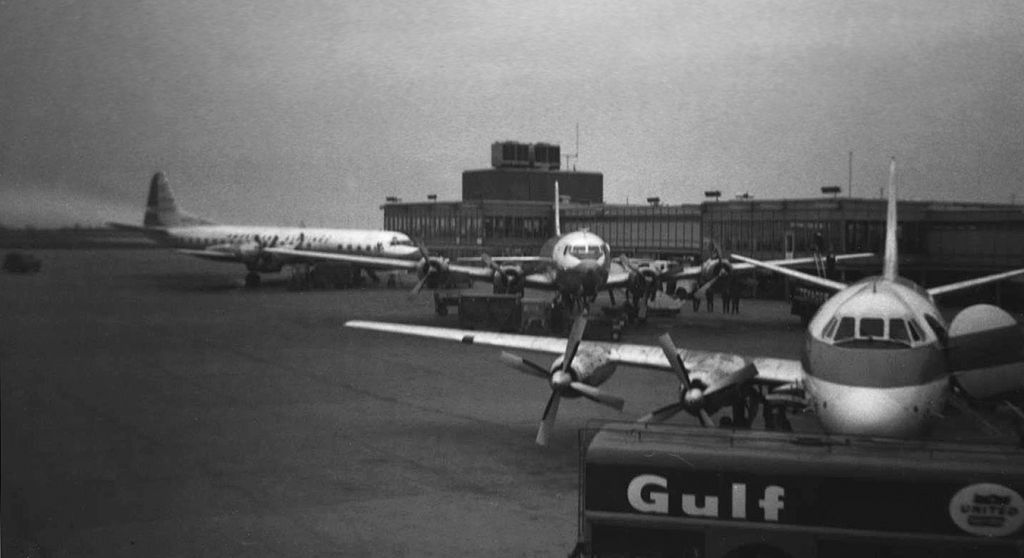 — — - At the urging of fellow aviation photography enthusiasts, I am sharing some of my photos "from the past."  This one has been previously shared on other sites, but to the best of my knowledge it is no longer viewable to the general public now except here.  This is a tabletop scan of a 50-year-old photograph (Kodak 127 film) taken on a Kodak Brownie camera in April, 1965, which means that I was 15 years old when I took it.  This was the age of propellers at what was then known as Greater Buffalo International Airport (now KBUF).  The photo shows an American Airlines Lockheed Electra, an American Airlines Douglas DC-6B, and a United Airlines Vickers Viscount.  The snap was taken from the United Terminal observation deck, which cost one dime to enter (but, if no one was looking, could be accessed by a young teen by bending under the turnstile bar ... lol). And back then, a dime saved was a dime that could be used toward buying more rolls of Kodak 127 film.  Incidentally, that portion of the GBIA terminal building visible in the background was only a couple years old; it had just been constructed as an addition to the airport for American Airlines to have five gates.    