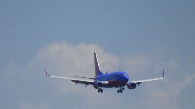 Boeing 737-700 — - Landing runway 23L.