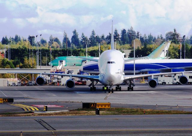 Cessna Skyhawk (N747BC) - Boeing Dreamlifter N747BC Taxiing & departure from Boeing Everett Facility/Paine Field, Snohomish county Airport Oct 17, 2012