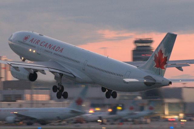 Airbus A330-300 (C-GFAJ) - Off to London Heathrow as the sun set quickly to the west.