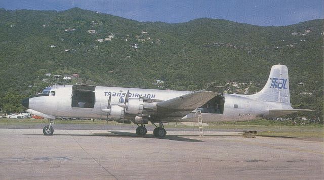 Douglas DC-6 (N779TA) - scanned from postcardbr /trans airlink