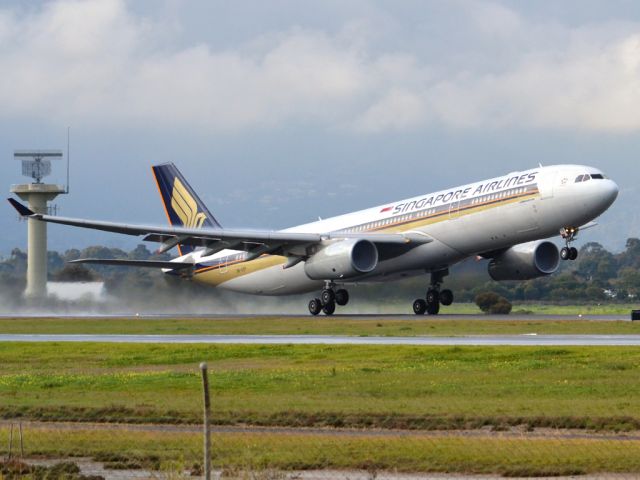 Airbus A330-300 (9V-STP) - Getting airborne off runway 23 on a gloomy, cold winters day and heading home to Singapore.  Wednesday 4th July 2012.