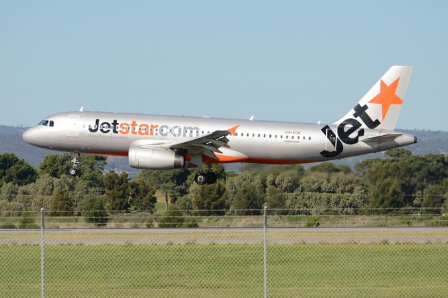 Airbus A320 (VH-VGN) - About to put down on runway 05. Wednesday, 21st May 2014.