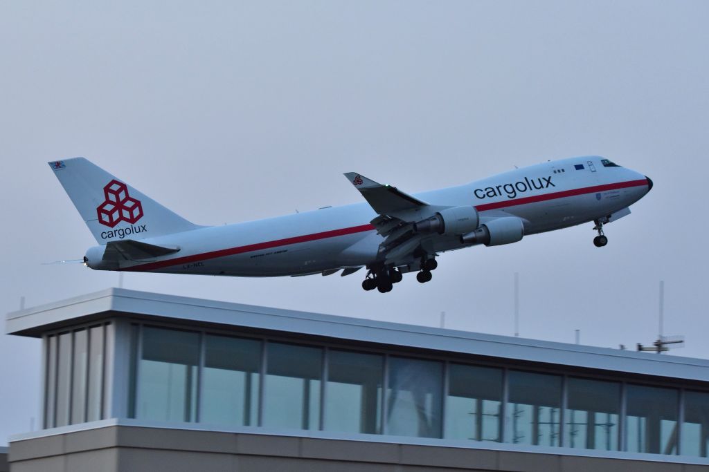 Boeing 747-400 (LX-NCL) - Departing 23-L on 09-12-21 at dawn, about six minutes prior to official sunrise