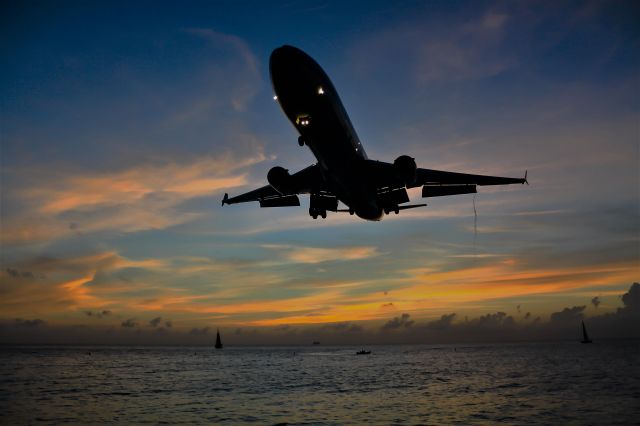 Boeing MD-11 (PH-KCD) - A great sight to see at the end of a wonderful day. KLM MD11 PH-KCD gracefully approaching the beach for landing!