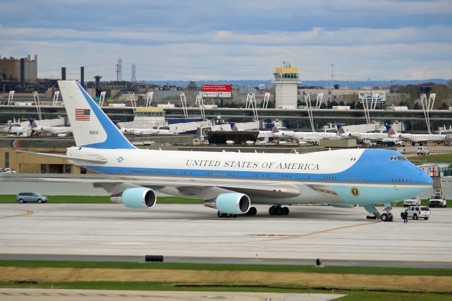 Boeing 747-200 (82-8000) - Air Force One, USAF VC-25A, B747-2G4B, tail number 82-8000, c/n 23824, parked on Pad-3 with D-concourse in the background as seen looking east from the old airport surveillance radar tower on 31 Oct 2010. Special clearance was obtained from the USSS for me to go up there to get the photo. The D-Concourse now sits abandon after United abandon the City of Cleveland and took their hub out.