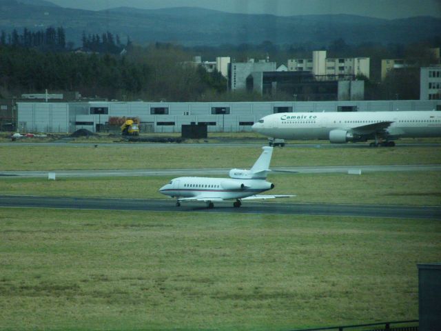 Dassault Falcon 900 (N209FJ) - N209FJ FALCON 900EX CN 02  SEEN ON DELTA 1 DEPARTING SHANNON TO CYQX ON 08/02/2011