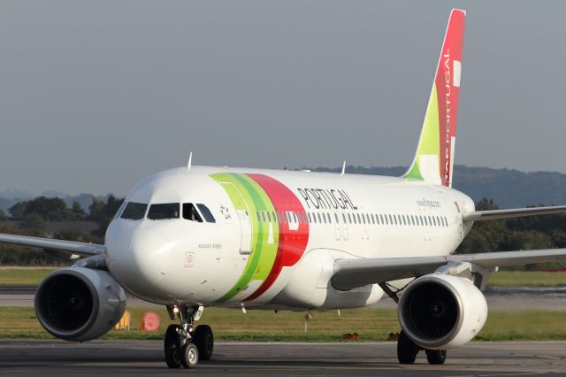 Airbus A320 — - Taxiing back to the Terminal at Manchester Airport.