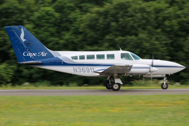 Cessna 402 (N36911) - June 6, 2022, rolling down runway 20.