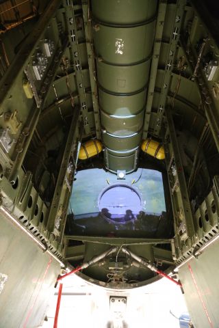 Boeing B-29 Superfortress (4470016) - Boeing B-29 Superfortress at Pima Air and Space Museum, Tucson, AZ, 17 May 14.  A movie is being displayed on the forward bulkhead of the forward bomb bay compartment.