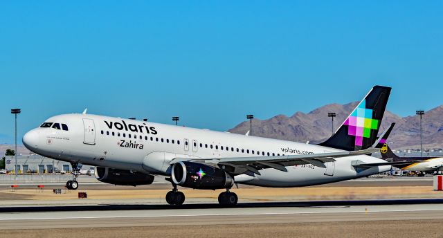 Airbus A320 (XA-VOZ) - XA-VOZ Volaris 2013 Airbus A320-233(WL) - cn 5819 "Zahira" Cap. Javier Matínez Villegas - Las Vegas - McCarran International Airport (LAS / KLAS)br /USA - Nevada October 24, 2015br /Photo: Tomás Del Coro