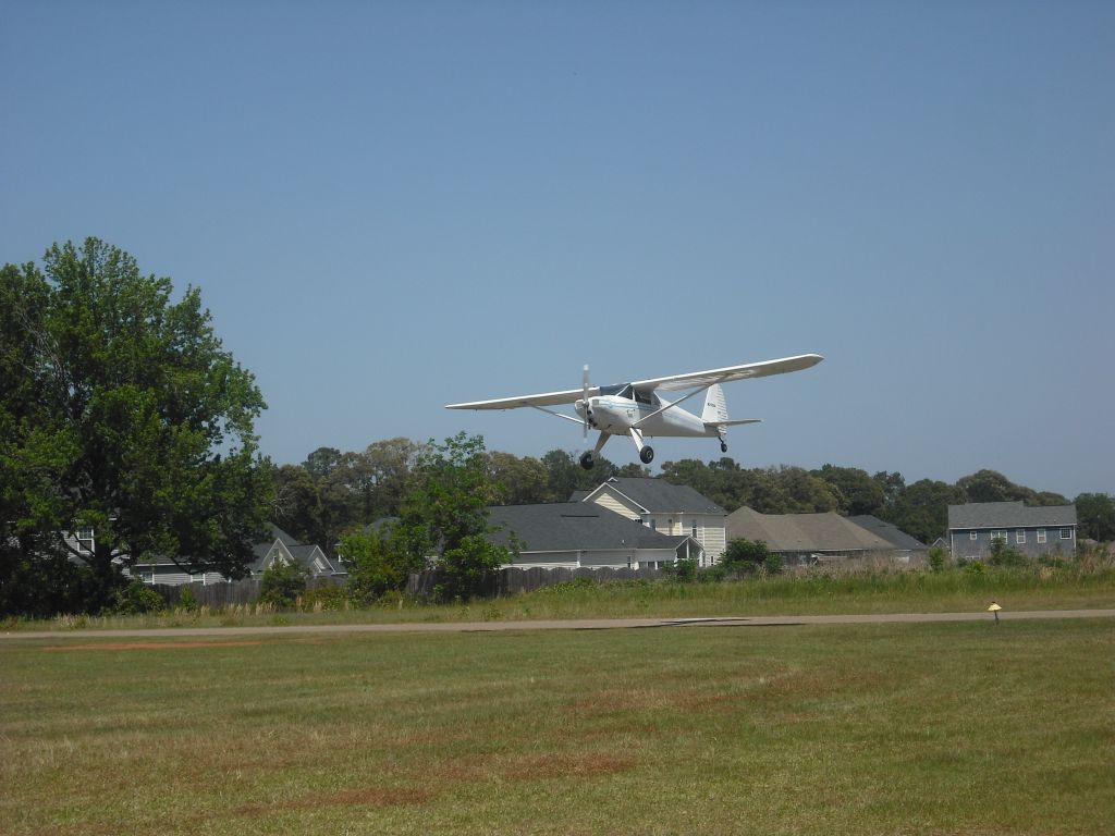 N2588K — - OVER THE FENCE AT 5A2 ROBINS AIR PARK EAA 38 SPRING PIC NIC 2011