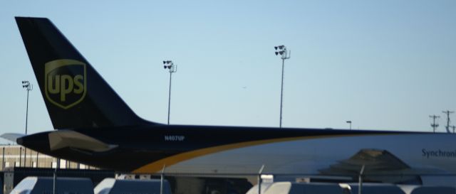 Boeing 757-200 (N407UP) - UPS 757-200 N407UP sits on the cargo ramp at the north east corner of the airport.