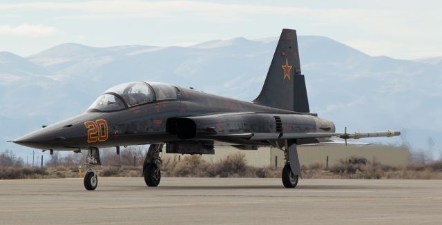 Northrop RF-5 Tigereye (76-1580) - NSAWCs beautiful black F5F Tiger (761580) approaches on NAS Fallons taxiway Bravo as it moves toward runway 31L to take off for a noon-hour training sortie.