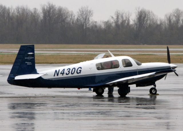 Mooney M-20 (N430G) - Garmins Mooney about to depart Downtown Shreveport in the pouring rain.