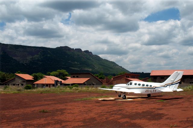 Cessna Chancellor (ZS-LTY) - At the Thabazimbi iron ore mine, South Africa. Everything is red here.