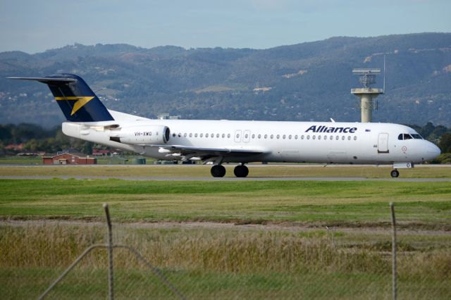 Fokker 100 (VH-XWO) - On taxiway heading for take-off on runway 05. Wednesday, 21st May 2014.