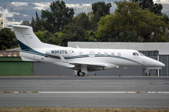 Embraer Phenom 300 (N302TG)