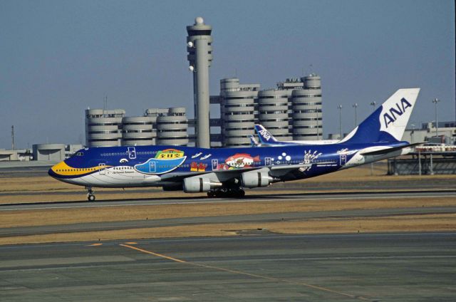 Boeing 747-400 (domestic, no winglets) (JA8963) - Landing at Tokyo-Haneda Intl Airport Rwy34L on 1995/02/12 "ANA Marine Jumbo c/s "