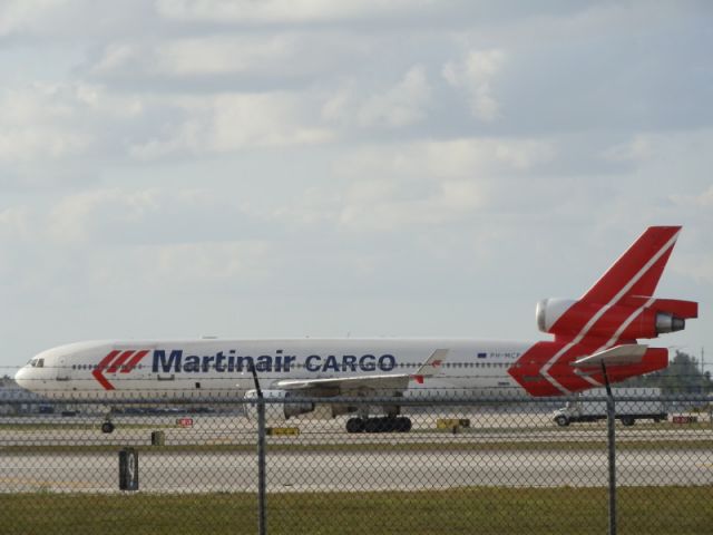 Boeing MD-11 (PH-MCP) - Making a left turn.Taxiing to the cargo area!