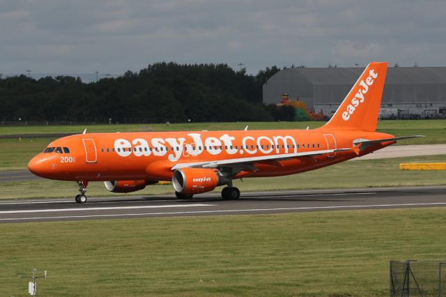 Airbus A320 (G-EZUI) - Wearing the 200th Airbus bright orange colour scheme, G-EZUI departs to Munich as EZY1887