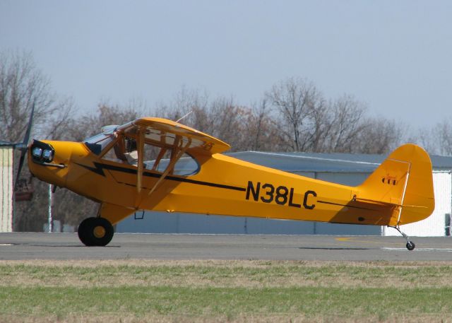 Piper L-21 Super Cub (N38LC) - Taxiing across runway 14 at the Downtown Shreveport airport.