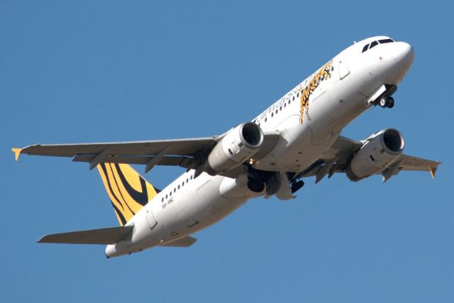 Airbus A320 (VH-VNC) - Getting airborne off runway and heading back to Melbourne. Thursday 4th April 2013.