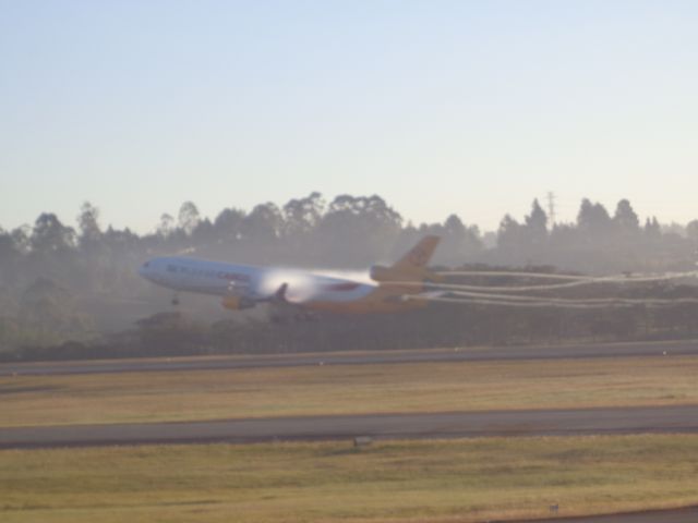 Boeing MD-11 (N951AR) - KYC524 Heavy to miami, with vortex in the early morning