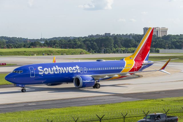 Boeing 737 MAX 8 (N8800L) - A curious Captain staring towards me