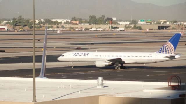 Boeing 757-200 (N504UA) - Flight 264 to Denver 6:36 A.M Departure.