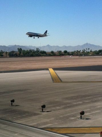 Airbus A320 — - A320 Landing 7R. Taken while taxing onto 7L for takeoff