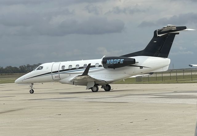 Embraer Phenom 300 (N80FE) - N80FE Taxing to Runway 27 for a flight to KTEB Teterboro  