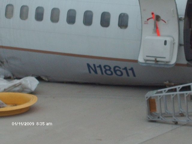 Boeing 737-700 (N18611) - The Continental flight that never left Denver. Flight 1404, they put the remains on the Continental hangar ramp for the investigation.