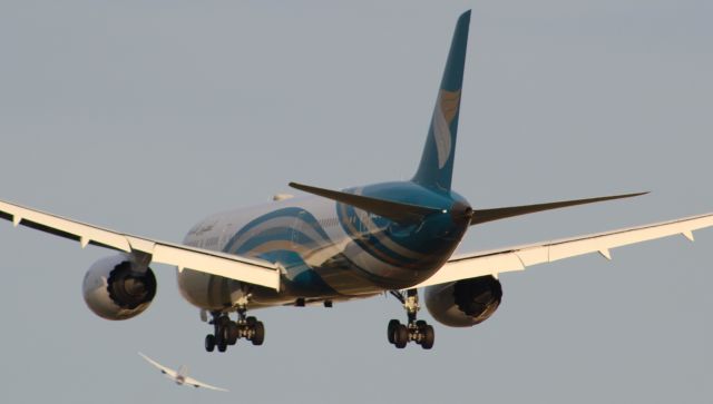 Boeing 787-9 Dreamliner (A40SG) - An Oman Air B787-9 on final approach into LHR, landing on runway 09L. The plane taking off was a Virgin Atlantic B787-9 as well.br /br /Location: Bath Road, above the London Orbital Motorway (M25),br /Date: 28.08.22 (dd/mm/yy).