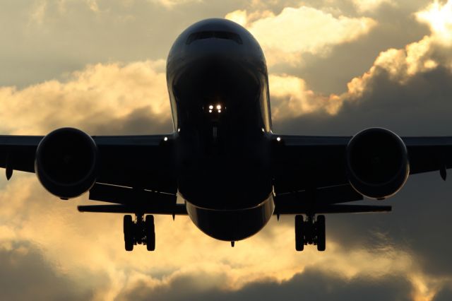 Boeing 777-200 — - Landing at LHR.