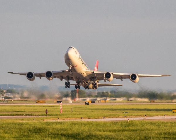 BOEING 747-8 (LX-VCA) - Blasting off to the north from DFW from the west runway complex.