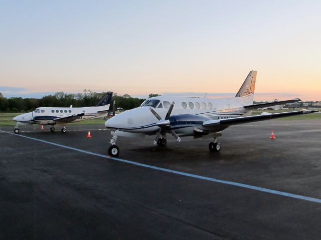 Pilatus PC-12 (VTE847) - A rare sight: 2 King Air B100 at one spot.br /These fine aircraft are available for charter in the Northeast from CFM Corporate Flight Management.