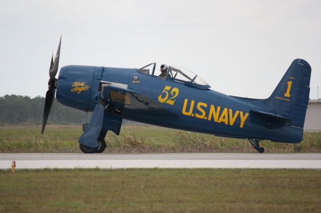 Cessna Citation CJ1 (N68RW) - F8F Bearcat performs during the 2012 Florida International Airshow